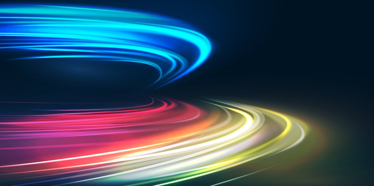 Neon light motion on a night highway